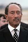 https://upload.wikimedia.org/wikipedia/commons/thumb/b/b0/Anwar_Sadat_cropped.jpg/100px-Anwar_Sadat_cropped.jpg